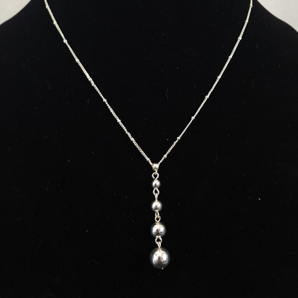 Avon Jewelry - VTG Avon Necklace Silver Tone Graduated Balls Vertical Drop Dainty Saturn Link